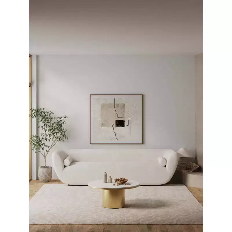 Table basse dorée avec plateau en pierre frittée